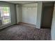 Bedroom with large window, closet, and plenty of space at 17900 E Asbury Dr, Aurora, CO 80013