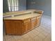 Kitchen island with ample cabinet storage and a breakfast bar area at 17900 E Asbury Dr, Aurora, CO 80013