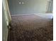 Bright living room features carpeted floors, neutral paint colors, and a window for natural light at 17900 E Asbury Dr, Aurora, CO 80013