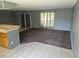 Cozy living room featuring neutral tones, plush carpet, and lots of natural light at 17900 E Asbury Dr, Aurora, CO 80013