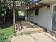 Backyard patio with wooden pergola, offering a relaxing outdoor space at 17900 E Asbury Dr, Aurora, CO 80013