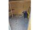 Interior of the shed showing storage with shelving and a plastic bin at 17900 E Asbury Dr, Aurora, CO 80013