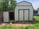 Spacious outdoor shed with double doors and an open side, offering ample storage at 17900 E Asbury Dr, Aurora, CO 80013