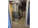 Mechanical/Utility Room showcasing the furnace and water heater at 17900 E Asbury Dr, Aurora, CO 80013
