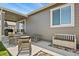 Cozy outdoor patio area with seating, perfect for relaxing and entertaining guests at 16099 Alberta Dr, Parker, CO 80134
