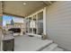 Spacious covered patio featuring recessed lights, sliding glass doors, and ample seating at 16099 Alberta Dr, Parker, CO 80134
