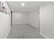 Finished basement with carpet flooring and neutral paint at 4102 W Union Ave, Denver, CO 80236