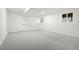 Finished basement with carpet flooring, bright natural light and neutral paint at 4102 W Union Ave, Denver, CO 80236