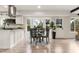 Bright dining area with lots of windows and stainless steel appliances at 4102 W Union Ave, Denver, CO 80236