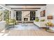Cozy living room with fireplace, stylish decor, and plenty of natural light at 4102 W Union Ave, Denver, CO 80236