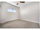 Neutral bedroom with carpet and trim, a window for natural light, and minimalist design, ready for personalization at 4258 Tennyson St # 101, Denver, CO 80212