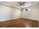 Bright bedroom with hardwood flooring, a ceiling fan, and a window offering natural light at 4258 Tennyson St # 101, Denver, CO 80212
