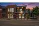 Modern brick building exterior with street view and pedestrian access at 4258 Tennyson St # 101, Denver, CO 80212