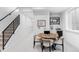 Finished basement showcasing a game area with a poker table and kitchenette for entertainment at 421 S Pearl St, Denver, CO 80209