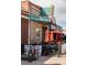 Street view of Candle Light Tavern with outdoor seating at 421 S Pearl St, Denver, CO 80209