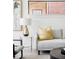 Comfortable living room area with couch, artwork, and stylish side table at 421 S Pearl St, Denver, CO 80209