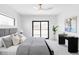 Stylish bedroom features a sliding glass door to the balcony, and modern decor at 421 S Pearl St, Denver, CO 80209