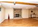Spacious finished basement features a brick fireplace and plenty of room for entertaining at 8160 W Phillips W Ave, Littleton, CO 80128