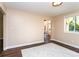 Open-concept dining area with hardwood flooring and ample natural light at 8160 W Phillips W Ave, Littleton, CO 80128
