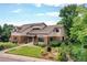 Beautifully landscaped front yard complements this home's inviting exterior at 8160 W Phillips W Ave, Littleton, CO 80128