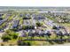 Aerial view of two-story home in a residential neighborhood, showcasing its community at 10778 Dayton Way, Commerce City, CO 80640