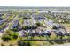 Aerial view of two-story home in a residential neighborhood, showcasing its community at 10778 Dayton Way, Commerce City, CO 80640