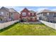 Lawn in the backyard; a spacious area for outdoor enjoyment at 10778 Dayton Way, Commerce City, CO 80640