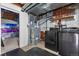 Unfinished basement with washing machine and dryer and furnace at 10778 Dayton Way, Commerce City, CO 80640
