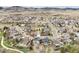 Beautiful aerial view of the residential community nestled at the foot of the mountains at 5986 Dunraven Ct, Golden, CO 80403