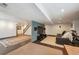 Finished basement featuring two distinct living areas, perfect for entertaining, relaxing, or home gym at 5986 Dunraven Ct, Golden, CO 80403