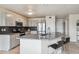Modern kitchen features a center island, sleek stainless steel appliances, and stylish cabinets at 5986 Dunraven Ct, Golden, CO 80403