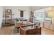 Cozy living room with vaulted ceilings, natural light, and comfortable seating at 5986 Dunraven Ct, Golden, CO 80403