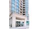Exterior of building entrance featuring stone columns, glass doors, and professional signage at 8100 E Union Ave # 2201, Denver, CO 80237