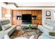 Inviting common room with comfortable seating, wood cabinetry, and elegant decor at 8100 E Union Ave # 2201, Denver, CO 80237