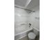 Bright bathroom featuring a clean white shower and toilet at 9262 E Arbor Cir # H, Englewood, CO 80111