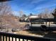 Balcony view showing parking and nearby homes during daytime at 9262 E Arbor Cir # H, Englewood, CO 80111