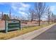 A view of Crescent Park and its attractive entrance signage at 755 Roslyn St # 17, Denver, CO 80230