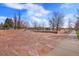 Stone path leading up to various park amenities and seating at 755 Roslyn St # 17, Denver, CO 80230