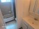 Bathroom with a vanity, mirror, and a tub with a shower curtain at 590 N Logan St # 303, Denver, CO 80203