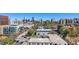 View of a city neighborhood with surrounding buildings, trees and skyline at 590 N Logan St # 303, Denver, CO 80203