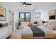 Cozy main bedroom with ample natural light, neutral tones, and modern furnishings at 1250 Yates St, Denver, CO 80204