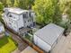 Aerial view of the property showcasing the backyard, patio, pergola, and modern architecture at 2420 S Gilpin St, Denver, CO 80210
