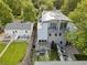 Aerial view of the property highlighting the backyard, landscaping, patio, and modern home design at 2420 S Gilpin St, Denver, CO 80210