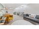 Bright living area with skylights, plush seating, and modern design accents at 2420 S Gilpin St, Denver, CO 80210