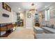 Cozy living room with comfortable seating, modern shelving, and a dedicated workspace at 2420 S Gilpin St, Denver, CO 80210