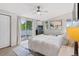 Bright, airy bedroom with balcony access, contemporary decor, and a comfortable feel at 2420 S Gilpin St, Denver, CO 80210