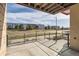 A balcony view showcases the building's architecture and surrounding landscape, perfect for relaxing outdoors at 9023 E Northfield Blvd, Denver, CO 80238