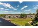 An aerial view of the property showcases the beautiful buildings and well-maintained landscaping at 13351 W Alameda Pkwy # 203, Lakewood, CO 80228