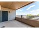 A private balcony featuring wrought iron railings and scenic views of the surrounding landscape at 13351 W Alameda Pkwy # 203, Lakewood, CO 80228