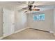 Inviting bedroom featuring natural light and a ceiling fan at 4812 W 8Th Ave, Denver, CO 80204